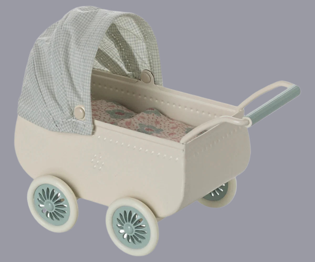 Maileg pram with baby mouse.