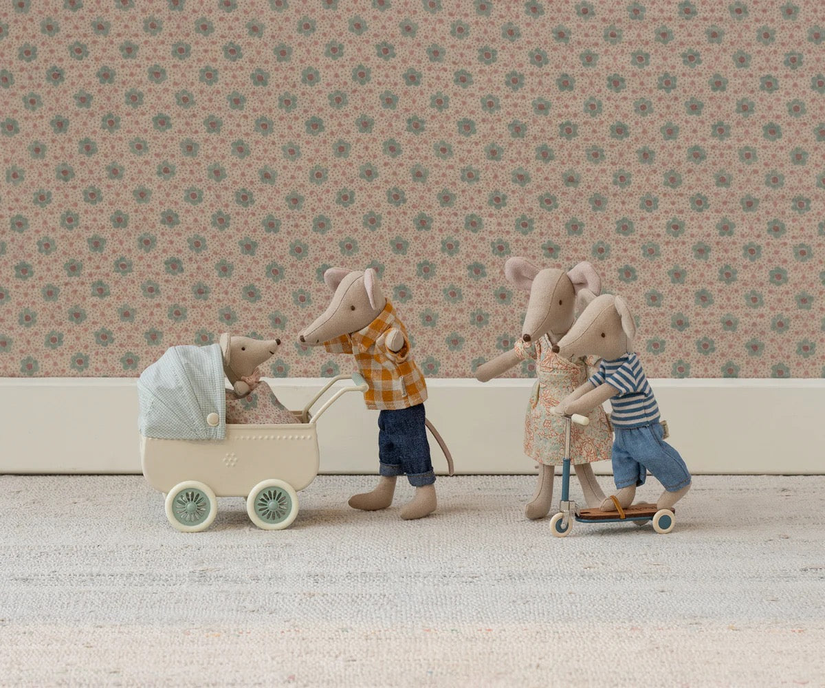 Maileg pram with baby mouse.