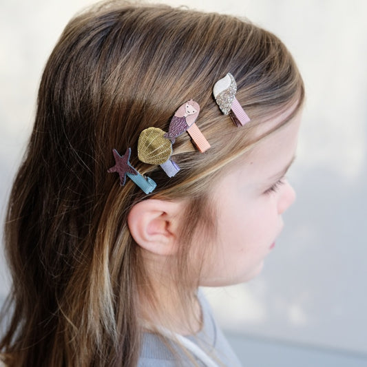 Mermaid hair clips.